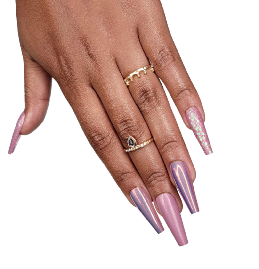 Model Wearing Casket Ready Beauty's Coffin-shaped long-length dark pink solid matte nails, with solid holographic glitter accent nails and solid holographic chrome accent nails.