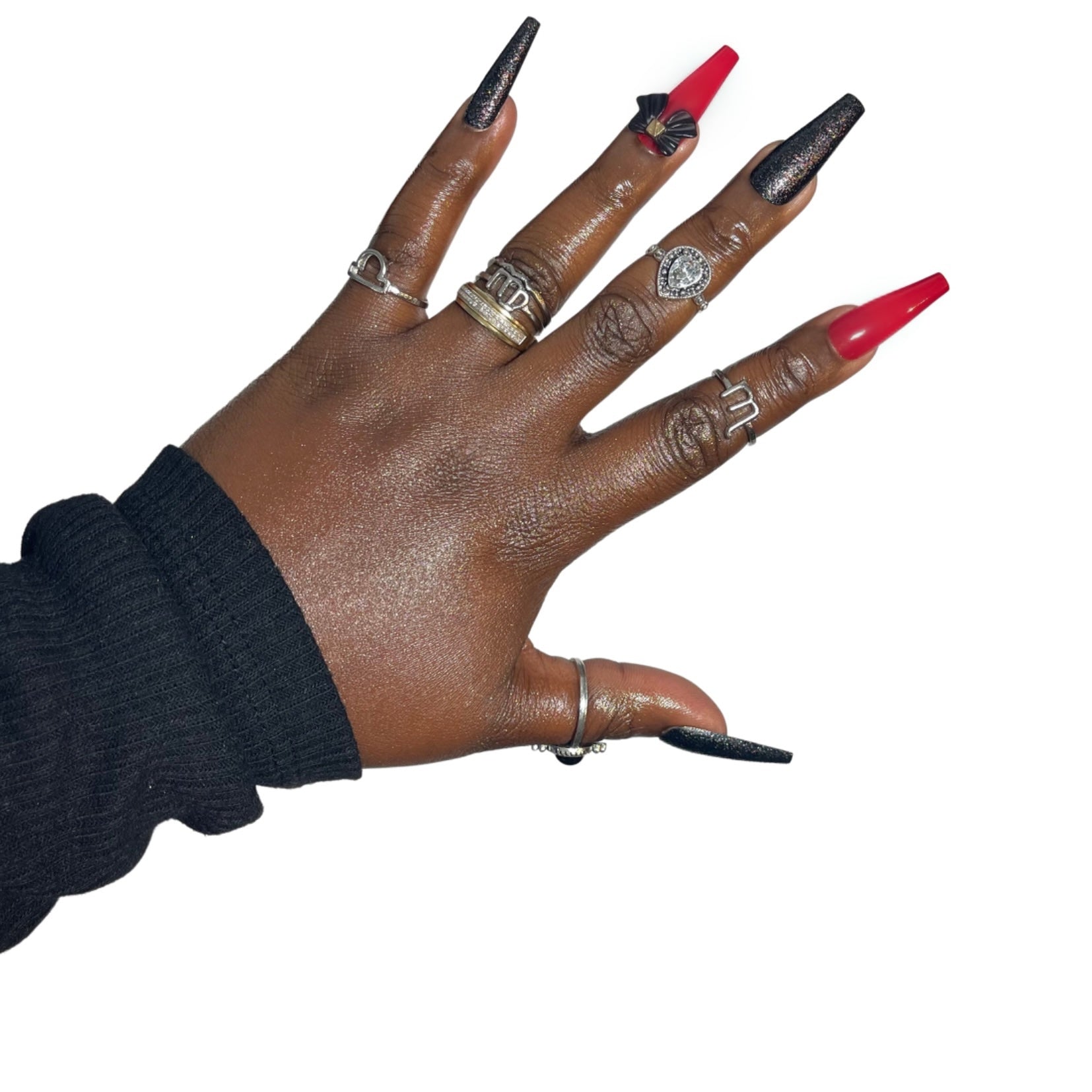 Model Wearing Casket Ready Beauty's Coffin-shaped long-length glossy solid red nails with solid red and gold glitter accent nails, with a black and gold bow.